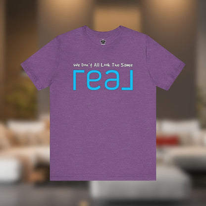 ✨ We Don’t All Look The Same – REAL Tee