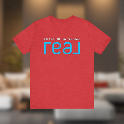 ✨ We Don’t All Look The Same – REAL Tee